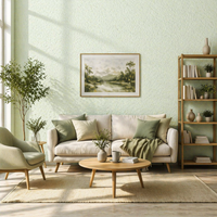 Beispielbild: Helles, modernes Wohnzimmer mit nahtloser Wandgestaltung aus Sajade Grace 3 Baumwollputz in sanftem Grün. Feine Naturfaser-Struktur sorgt für eine ruhige, hochwertige Oberfläche. Einrichtung im skandinavischen Stil mit Sofa, Sessel und Holzdetails, durchflutet von natürlichem Tageslicht.